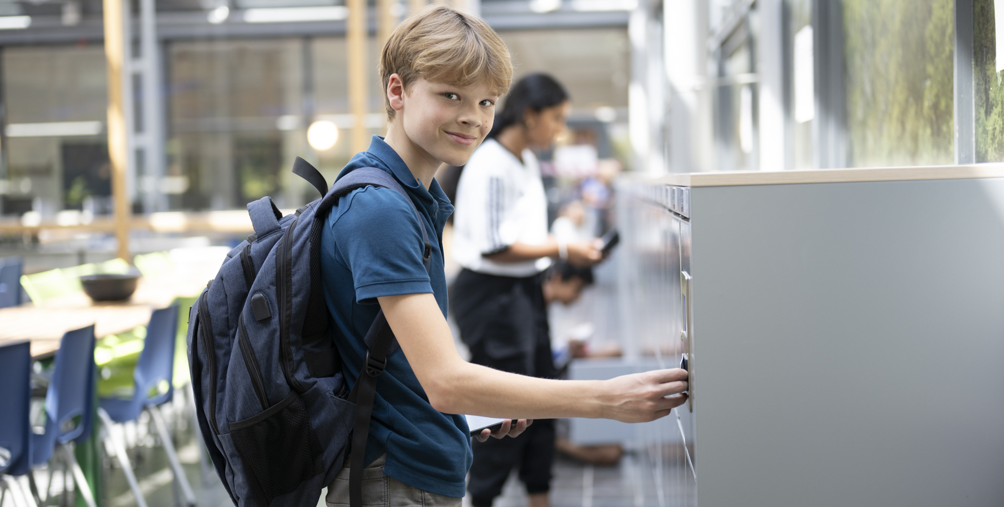 student at locker at Lorentz Casimir College